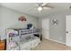 Bedroom features bunk beds, ceiling fan, and a red truck wall decor at 457 Skiles Ct, Suwanee, GA 30024