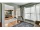 Inviting living room with hardwood floors, neutral decor, and plenty of natural light at 457 Skiles Ct, Suwanee, GA 30024