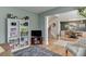 Spacious, light-filled living room that leads to dining room and other areas of the home at 457 Skiles Ct, Suwanee, GA 30024