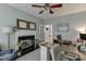 Bright home office with fireplace, built-ins, and desk area for work and study at 457 Skiles Ct, Suwanee, GA 30024