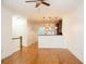 Open living space with hardwood floors and a view of the kitchen at 5523 Glenridge Ne Park, Atlanta, GA 30342