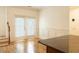 Open dining room features hardwood floors, bright french doors, and staircase at , Atlanta, GA 30342