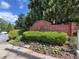 Glenridge Creek Townhomes signage surrounded by manicured landscaping and greenery at , Atlanta, GA 30342
