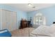 Comfortable bedroom featuring a desk and a bright white interior at 120 Ashewoode Downs Ln, Alpharetta, GA 30005