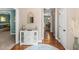 Entryway with hardwood floors and access to living, dining, and other areas of the home at 120 Ashewoode Downs Ln, Alpharetta, GA 30005