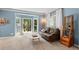 Bright living room with a bay window, creating a cozy and inviting space at 120 Ashewoode Downs Ln, Alpharetta, GA 30005