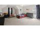 Playful bedroom features a car-shaped bed, car curtains and fun decor at 2030 Darien Park Dr, Roswell, GA 30076