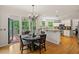 Kitchen with breakfast nook featuring a dining table and exterior access to a deck at 2030 Darien Park Dr, Roswell, GA 30076