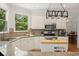 Spacious kitchen boasts granite countertops, white cabinets, and stainless steel appliances at 2030 Darien Park Dr, Roswell, GA 30076