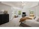 Spacious main bedroom features a tray ceiling, neutral colors and ensuite bathroom at 2030 Darien Park Dr, Roswell, GA 30076