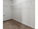 Walk-in closet with carpet and wire shelving at 261 Mahone Dr, Lilburn, GA 30047