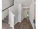 Bright entryway with hardwood floors and staircase at 261 Mahone Dr, Lilburn, GA 30047