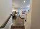 Open-concept living space with hardwood floors and seamless flow from kitchen to living room at 261 Mahone Dr, Lilburn, GA 30047