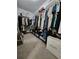 Spacious walk-in closet with ample storage and organizational space at 261 Mahone Dr, Lilburn, GA 30047