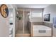 Bathroom with a glass door shower and soaking tub at 525 Clinton Dr, Temple, GA 30179