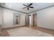Large bedroom showcasing neutral tones, recessed lighting, wood-look flooring, and two large doorways at 101 Morgan Ln, Canton, GA 30115