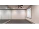 Bonus room featuring a mirrored wall, carpet flooring, recessed lighting, and a window for natural light at 101 Morgan Ln, Canton, GA 30115
