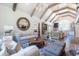 Spacious living room with vaulted ceilings, modern furniture, and natural light at 101 Morgan Ln, Canton, GA 30115