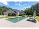 Sparkling swimming pool with comfortable lounge chairs, perfect for enjoying the outdoors at 101 Morgan Ln, Canton, GA 30115