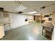 Unfinished basement with workbench, open layout, and potential for customization to suit various needs and projects at 125 Cannongate Cir, Sharpsburg, GA 30277