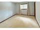Bedroom with neutral walls and carpeted floor featuring a window with blinds at 125 Cannongate Cir, Sharpsburg, GA 30277