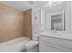 Well-lit bathroom with a tub, tiled shower, and a modern vanity with a sink at 4089 Thorndale Ln # 13, Smyrna, GA 30080