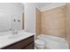 Bathroom featuring single vanity and bath tub with tiled shower at 4089 Thorndale Ln # 13, Smyrna, GA 30080