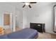 Bedroom featuring a ceiling fan, carpet flooring and ensuite bathroom at 4089 Thorndale Ln # 13, Smyrna, GA 30080
