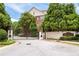 Gated community entrance with brick pillars, providing security and a sense of exclusivity at 4089 Thorndale Ln # 13, Smyrna, GA 30080
