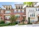 Beautiful brick townhome with a balcony and a manicured front yard in a desirable community at 4089 Thorndale Ln # 13, Smyrna, GA 30080