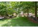 Beautiful townhomes with manicured green spaces and mature trees provide a serene community setting at 4089 Thorndale Ln # 13, Smyrna, GA 30080