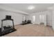 Spacious home gym featuring a treadmill and weight lifting equipment at 4089 Thorndale Ln # 13, Smyrna, GA 30080
