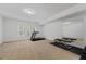Spacious home gym featuring exercise equipment and a well-lit workout area at 4089 Thorndale Ln # 13, Smyrna, GA 30080