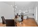 Modern kitchen with sleek cabinets, stainless steel appliances, and an open layout connected to the dining area at 4089 Thorndale Ln # 13, Smyrna, GA 30080