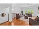 Bright living room with a view from the upper floor, hardwood floors, neutral paint and a fireplace at 4089 Thorndale Ln # 13, Smyrna, GA 30080