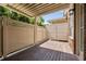 Private outdoor patio with a wooden deck, privacy fencing, and a covered area for relaxation at 4089 Thorndale Ln # 13, Smyrna, GA 30080