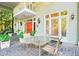 Spacious outdoor patio features elegant tile flooring and an outdoor dining area with stylish doors at 893 Piedmont Ne Ave # 5, Atlanta, GA 30309