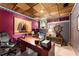Finished basement office space featuring wood panel ceiling and vibrant paint color at 1950 Wenlok Ne Trl, Marietta, GA 30066