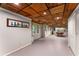 Open basement space with recessed lighting and a pool table, offering ample room for entertainment at 1950 Wenlok Ne Trl, Marietta, GA 30066