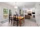 Open dining area with views into the kitchen and adjacent living room at 1950 Wenlok Ne Trl, Marietta, GA 30066