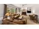 Cozy living room featuring plush sofas, a fireplace, and built-in shelving at 1950 Wenlok Ne Trl, Marietta, GA 30066