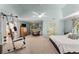 Spacious main bedroom with a ceiling fan, sitting area and a exercise machine at 1950 Wenlok Ne Trl, Marietta, GA 30066