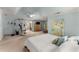 Main bedroom with a ceiling fan, sitting area and exercise machine and ensuite bath at 1950 Wenlok Ne Trl, Marietta, GA 30066