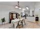 Bright dining room features an antique cabinet and seating for four at 2220 Lily Valley Dr, Lawrenceville, GA 30045