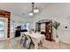 Bright dining room features an antique cabinet and seating for four at 2220 Lily Valley Dr, Lawrenceville, GA 30045