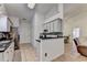 Beautiful kitchen featuring granite countertops, tile floors, stainless appliances, and lots of storage at 2220 Lily Valley Dr, Lawrenceville, GA 30045