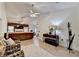 Spacious living room with tile floors, high ceilings, neutral walls, and a view into other rooms at 2220 Lily Valley Dr, Lawrenceville, GA 30045