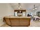 Well-lit living room features an open layout, stylish furniture, and easy access to the dining area at 2220 Lily Valley Dr, Lawrenceville, GA 30045