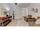 Inviting living room with tile floors, high ceilings, neutral walls, and tastefully arranged furniture at 2220 Lily Valley Dr, Lawrenceville, GA 30045