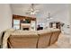 Bright living room features a fireplace and a cozy sectional sofa at 2220 Lily Valley Dr, Lawrenceville, GA 30045